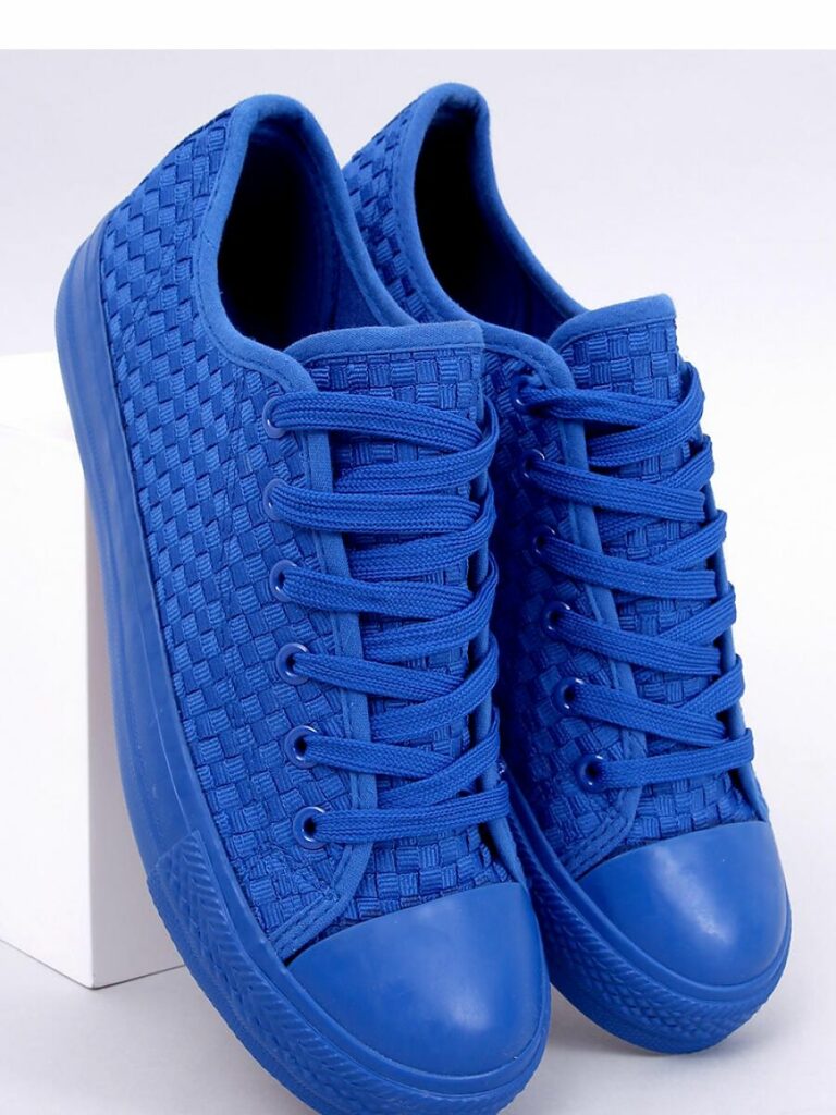 Step in style - blauwe sneakers met structuur motief 